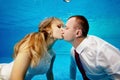 Man and woman kissing underwater in the swimming pool Royalty Free Stock Photo