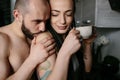 Man and woman in the kitchen Royalty Free Stock Photo