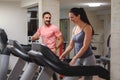 Man and woman laughing on treadmill Royalty Free Stock Photo