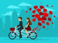 Man and woman in love riding a tandem bike with balloons as hearts Royalty Free Stock Photo