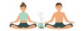 A man and a woman meditate in the lotus position. Happy couple practicing yoga class. Young people do yoga in asana Royalty Free Stock Photo