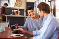 Man and woman meeting over coffee in a restaurant Royalty Free Stock Photo