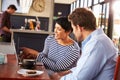 Man and woman meeting over coffee in a restaurant Royalty Free Stock Photo