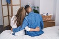 Man and woman mother and son hugging each other at bedroom Royalty Free Stock Photo