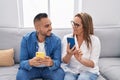 Man and woman mother and son using smartphone at home Royalty Free Stock Photo