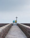 Man and woman at observatory deck of Chapel Santa Maria degli Angeli on top of Monte Tamaro Royalty Free Stock Photo
