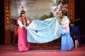 A man and a woman are performing a Chinese opera with thousands of years of history