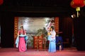 A man and a woman are performing a Chinese opera with thousands of years of history