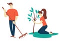 Man and woman planting tree gardening and growing hobby