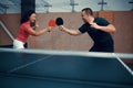 Man and woman play table tennis, ping pong players Royalty Free Stock Photo