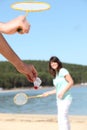 Man and woman playing badminton Royalty Free Stock Photo