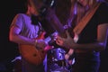 Man and woman playing guitars in nightclub Royalty Free Stock Photo