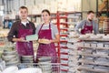 Man and woman posing with ceramic dishes Royalty Free Stock Photo