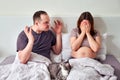 Man and woman quarrel, husband yells at pregnant wife