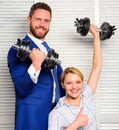 Man and woman raise heavy dumbbells. Strong powerful business strategy. Boss businessman manager raise hand with Royalty Free Stock Photo