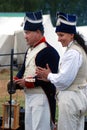 Man and woman reenactors at Borodino battle historical reenactment in Russia