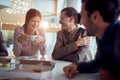 Man and woman in restaurant lunch and talks Royalty Free Stock Photo