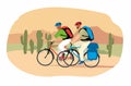 A man and a woman ride bicycles across the American desert Royalty Free Stock Photo