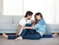 Man, woman and romantic love in home by couch with relationship trust for relaxing, together or bonding. Happy couple Royalty Free Stock Photo