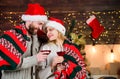 Man woman santa claus hats cheerful celebrating new year. Romantic ideas celebration. Merry christmas. Celebrating