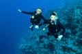 Man and woman scuba diver togrther