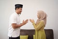 Man and woman shake hand muslim touching apologizing