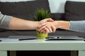 Man and woman shake hands close-up. Family quarrel, showdown, property division, divorce agreement Royalty Free Stock Photo