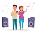 Man and woman sing karaoke