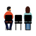 A man and a woman sit on chairs with their backs to the front. A man looks at a woman. Listeners, viewers on training
