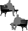 Man and woman sitting on the park bench