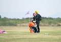 Man and woman skydiving and lover partners talking after success