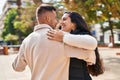 Man and woman smiling confident dancing at park Royalty Free Stock Photo