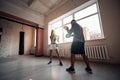 A man and a woman sparring partners train in the fighters training hall in boxing gloves with paws Royalty Free Stock Photo
