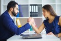 Man and woman staring at each other with hostile expressions. Royalty Free Stock Photo