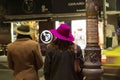 man and woman on the street at night