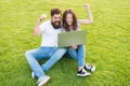 Man and woman surfing internet on notebook. students life. online shopping. communication online. happy couple use Royalty Free Stock Photo