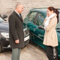 Man and woman talking after car crash Royalty Free Stock Photo
