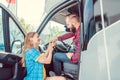 Man and woman testing a camper van or RV
