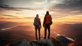 man and woman tourist hiking at mountain peak at sunset, romantic hikers couple standing at cliff at sunrise