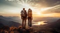 man and woman tourist hiking at mountain peak at sunset, romantic hikers couple standing at cliff at sunrise