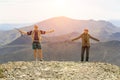 Man and woman tourists stand on the top of Poklonnaya Gora against the background of Mount Karabash Royalty Free Stock Photo