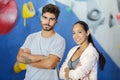 man and woman training at indoor climbing gym wall Royalty Free Stock Photo