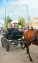 Man and woman in vintage coach