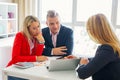 Man and woman visiting financial adviser