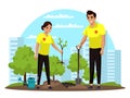 Man and woman volunteer planting tree in green park