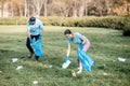 Volunteers cleaning public park from the rubbish