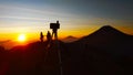 Man and woman waiting for beautiful sunrise in Sikunir-Dieng Central Java Royalty Free Stock Photo