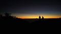 Man and woman waiting for beautiful sunrise in Sikunir-Dieng Central Java Royalty Free Stock Photo