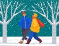 Man and Woman Walk in Snowy Lawn, Winter Time Royalty Free Stock Photo