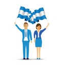 Man and woman waving Argentina flags